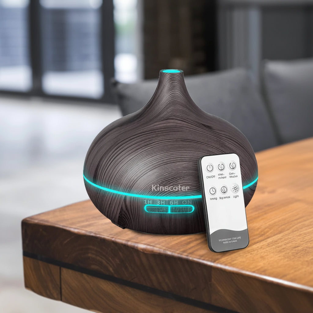 Aroma diffuser with remote control on a wooden surface, featuring dark wood grain design.